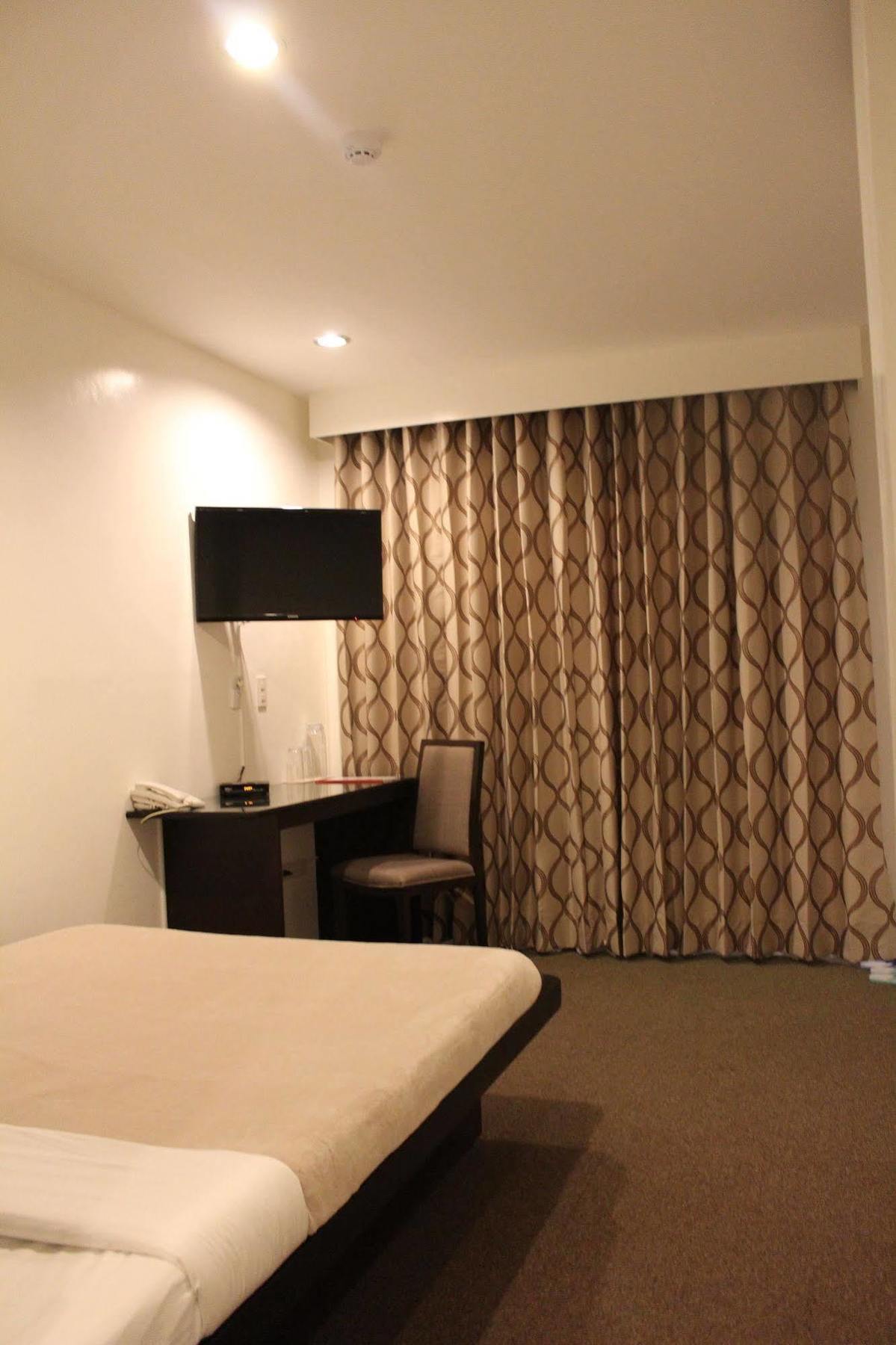Be-Ing Suites Davao Stadt Exterior foto
